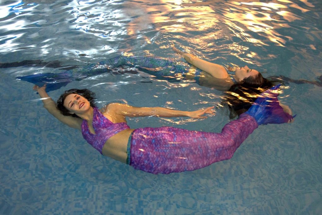 adult Mermaid swimming tricks